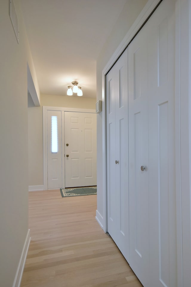 15608 Petunia Ct, Orland Park, IL 60462 - entrance foyer featuring baseboards and light wood-style floors