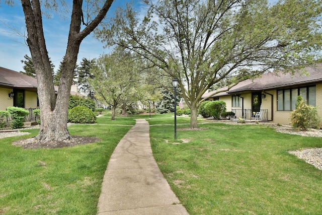 15608 Petunia Ct, Orland Park, IL 60462 - view of green lawn with covered porch
