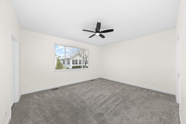 1468 W Grand Haven Rd, Romeoville, IL 60446 - empty room featuring baseboards, carpet, and a ceiling fan
