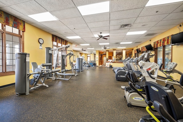 1468 W Grand Haven Rd, Romeoville, IL 60446 - gym featuring a drop ceiling, plenty of natural light, and ceiling fan