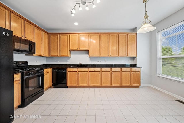 412 W Wood St, Palatine, IL 60067 - kitchen with black appliances, a sink, baseboards, decorative light fixtures, and light tile patterned flooring