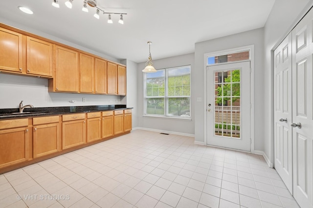 412 W Wood St, Palatine, IL 60067 - kitchen with a sink, baseboards, hanging light fixtures, and light tile patterned flooring