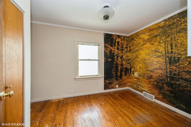 533 Clarence Ave, Oak Park, IL 60304 - empty room featuring baseboards, wood finished floors, and crown molding