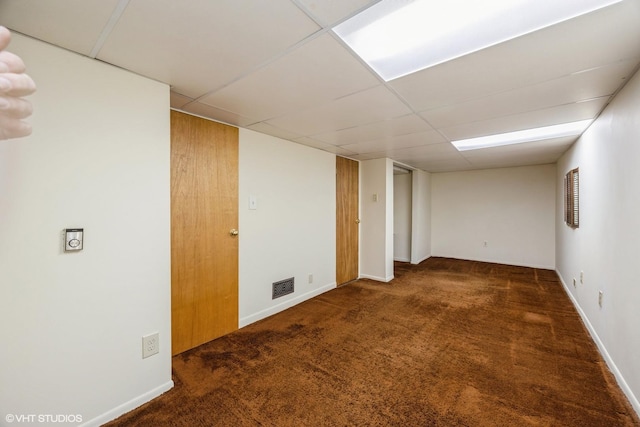 533 Clarence Ave, Oak Park, IL 60304 - unfurnished room featuring carpet, a paneled ceiling, and baseboards