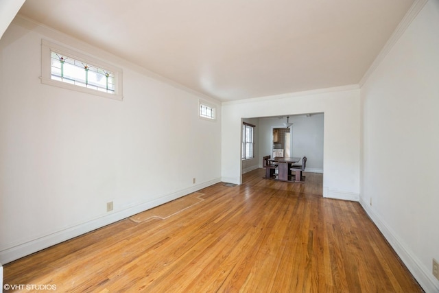 533 Clarence Ave, Oak Park, IL 60304 - unfurnished room featuring plenty of natural light, wood finished floors, crown molding, and baseboards