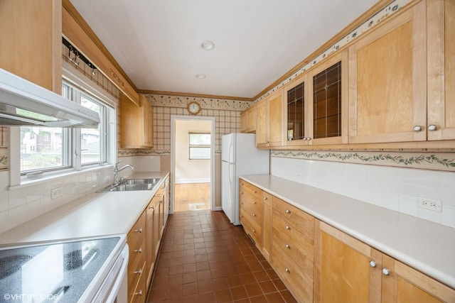 533 Clarence Ave, Oak Park, IL 60304 - kitchen with white appliances, a sink, wallpapered walls, healthy amount of natural light, and glass insert cabinets