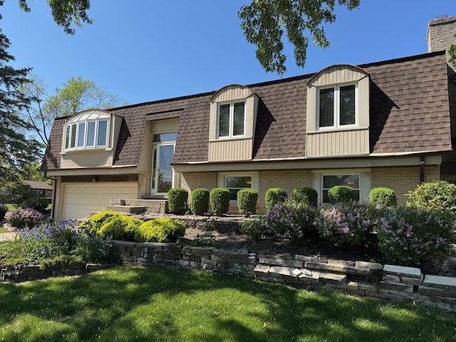 416 Trinity Ct, Buffalo Grove, IL 60089 - view of front property with roof with shingles, mansard roof, and brick siding