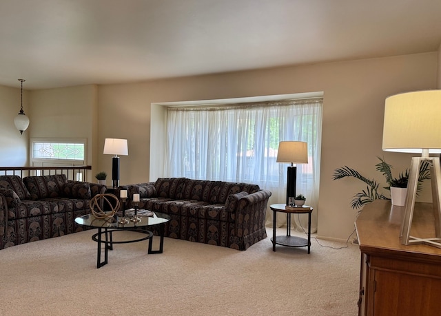 living room with carpet and plenty of natural light