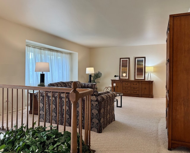 living area featuring carpet flooring