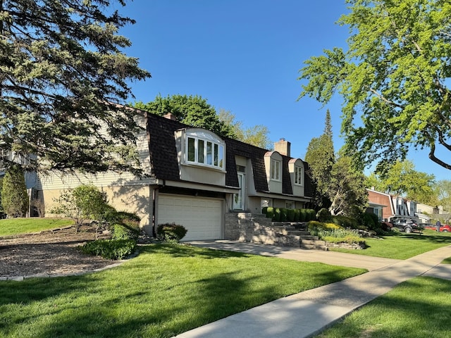 front of property featuring mansard roof, roof with shingles, a chimney, and a front yard