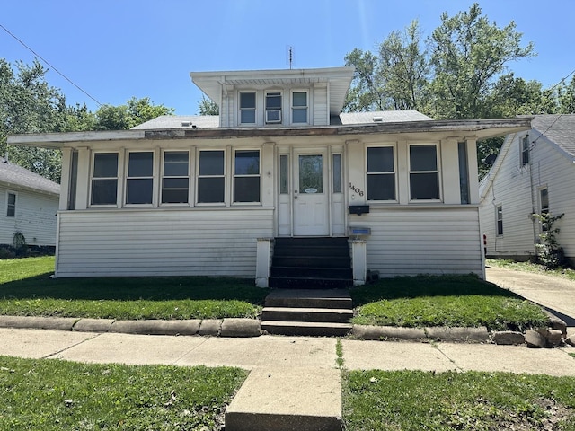 1406 W Locust St, Bloomington, IL 61701 - view of front of house featuring entry steps and a front yard