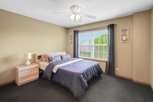 bedroom featuring carpet floors, baseboards, and ceiling fan
