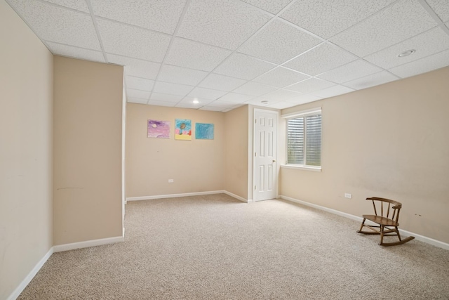 718 Northgate Dr, Sycamore, IL 60178 - below grade area featuring carpet, a drop ceiling, and baseboards