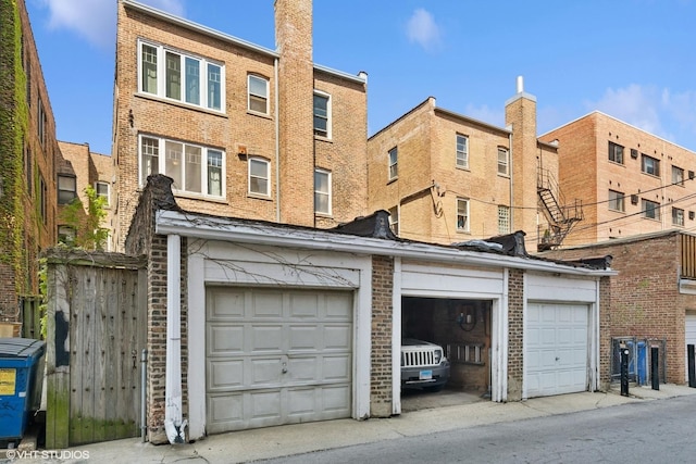 rear view of property featuring brick siding