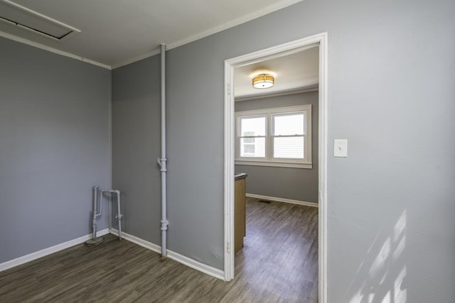 1705 Lyons Ct, Waukegan, IL 60085 - unfurnished room with ornamental molding, dark wood-style floors, and baseboards
