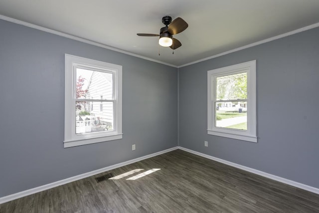 1705 Lyons Ct, Waukegan, IL 60085 - empty room featuring healthy amount of natural light, dark wood finished floors, ornamental molding, baseboards, and ceiling fan