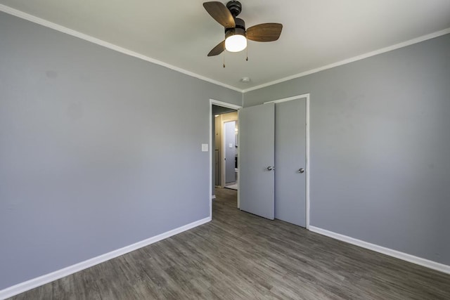 1705 Lyons Ct, Waukegan, IL 60085 - unfurnished bedroom with wood finished floors, baseboards, crown molding, and ceiling fan