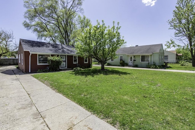 1705 Lyons Ct, Waukegan, IL 60085 - ranch-style house with roof with shingles