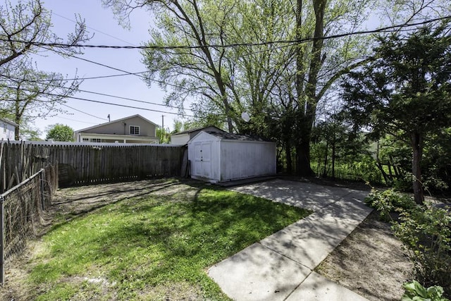 1705 Lyons Ct, Waukegan, IL 60085 - view of yard with a shed and an outbuilding
