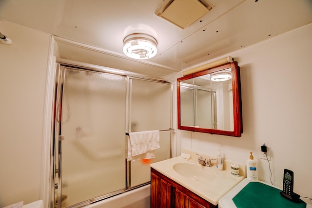218 W Fleming St, Watseka, IL 60970 - full bath featuring combined bath / shower with glass door and vanity