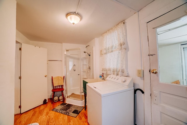 218 W Fleming St, Watseka, IL 60970 - washroom with washer / dryer and light wood finished floors