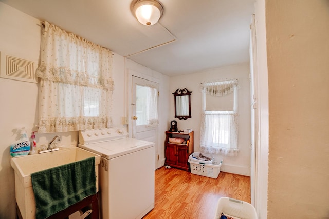 218 W Fleming St, Watseka, IL 60970 - laundry area featuring washer / clothes dryer, light wood-style flooring, and healthy amount of natural light