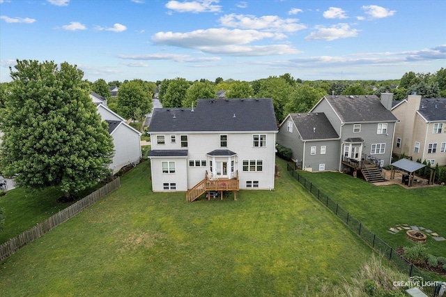 S970 Newton Sq, Geneva, IL 60134 - back of property with roof with shingles, a residential view, and stairs