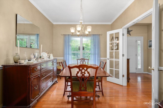 S970 Newton Sq, Geneva, IL 60134 - dining area with a chandelier, light wood-type flooring, and ornamental molding