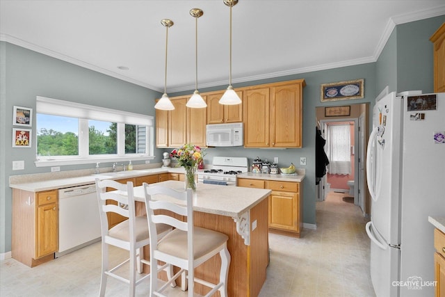 S970 Newton Sq, Geneva, IL 60134 - kitchen featuring white appliances, a sink, a kitchen island, crown molding, and light countertops