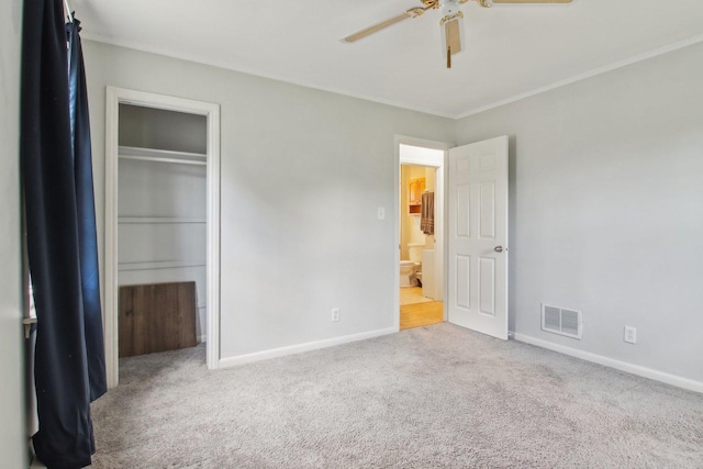 35790 N Wilson Rd, Ingleside, IL 60041 - unfurnished bedroom with carpet flooring, baseboards, a closet, ceiling fan, and crown molding