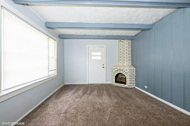 6609 173rd Pl, Tinley Park, IL 60477 - unfurnished living room featuring beam ceiling, carpet, and baseboards