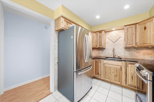 6436 W 64th Pl Unit A3, Chicago, IL 60638 - kitchen featuring appliances with stainless steel finishes, light brown cabinetry, a sink, backsplash, and recessed lighting