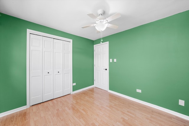 6436 W 64th Pl Unit A3, Chicago, IL 60638 - unfurnished bedroom featuring wood finished floors, baseboards, a closet, and ceiling fan