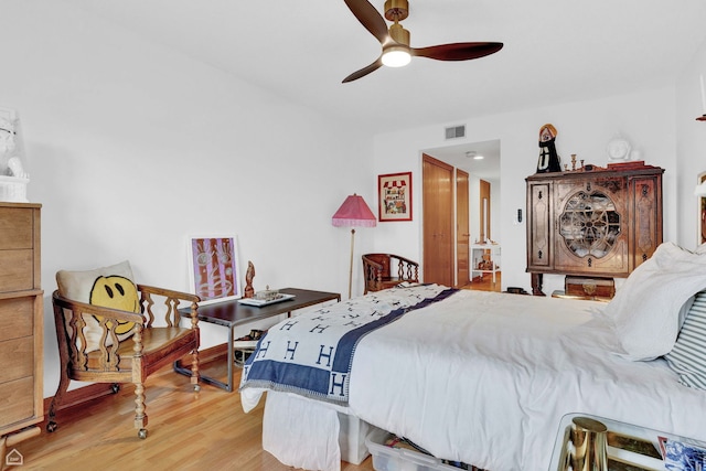724 12th St Unit 303, Wilmette, IL 60091 - bedroom featuring wood finished floors and ceiling fan