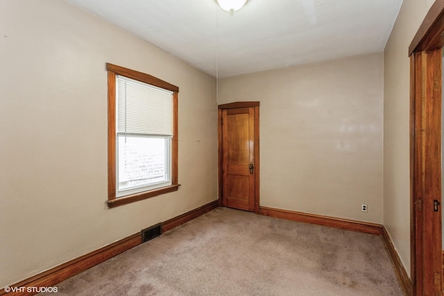 5000 N Kenneth Ave, Chicago, IL 60630 - unfurnished room with light colored carpet and baseboards