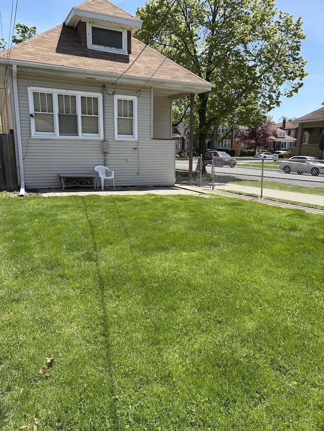 5000 N Kenneth Ave, Chicago, IL 60630 - rear view of property featuring roof with shingles