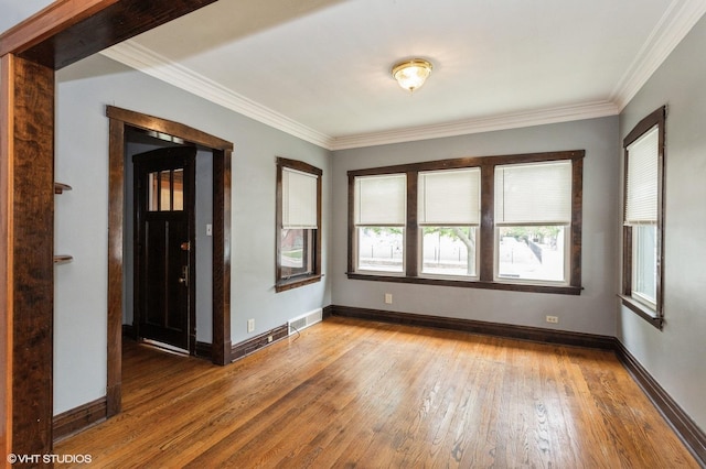 5000 N Kenneth Ave, Chicago, IL 60630 - spare room with hardwood / wood-style flooring, ornamental molding, and baseboards