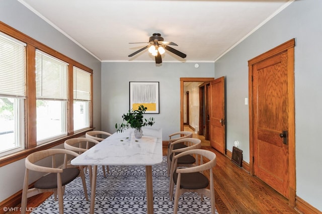 5000 N Kenneth Ave, Chicago, IL 60630 - dining area featuring wood finished floors, a ceiling fan, baseboards, and crown molding