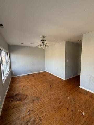 8370 S Baker Ave, Chicago, IL 60617 - empty room with baseboards, wood-type flooring, and ceiling fan
