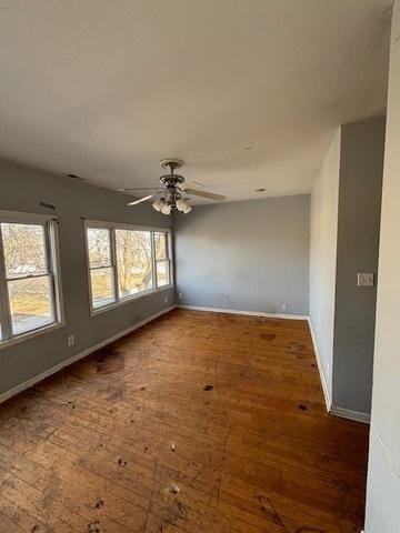 8370 S Baker Ave, Chicago, IL 60617 - spare room with hardwood / wood-style floors, baseboards, and a ceiling fan
