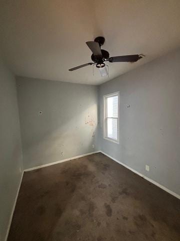 8370 S Baker Ave, Chicago, IL 60617 - unfurnished room with baseboards, ceiling fan, and dark carpet