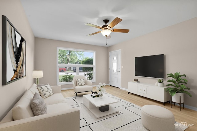 304 John St, North Aurora, IL 60542 - living area with plenty of natural light, light wood-style flooring, and ceiling fan