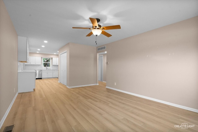 304 John St, North Aurora, IL 60542 - unfurnished living room featuring light wood finished floors, ceiling fan, baseboards, and recessed lighting