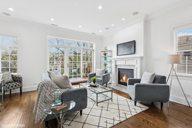 3737 N Clifton Ave Unit 3, Chicago, IL 60613 - living room featuring wood finished floors, ornamental molding, plenty of natural light, a high end fireplace, and baseboards