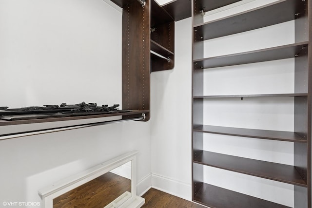 3737 N Clifton Ave Unit 3, Chicago, IL 60613 - walk in closet with dark wood-style flooring