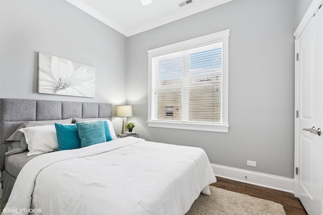 3737 N Clifton Ave Unit 3, Chicago, IL 60613 - bedroom with baseboards, wood finished floors, and ornamental molding