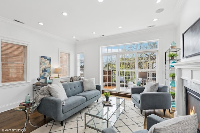 3737 N Clifton Ave Unit 3, Chicago, IL 60613 - living area with wood finished floors, recessed lighting, a high end fireplace, baseboards, and crown molding