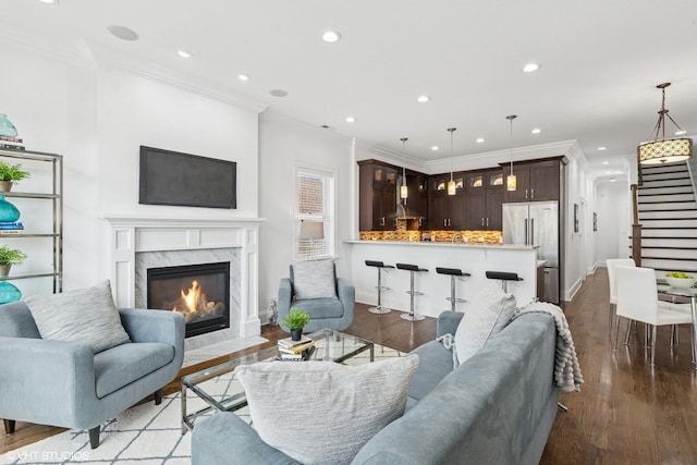 3737 N Clifton Ave Unit 3, Chicago, IL 60613 - living area with stairway, wood finished floors, crown molding, recessed lighting, and a premium fireplace