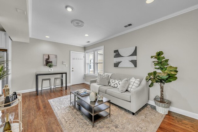 1438 W Roscoe St Unit 3, Chicago, IL 60657 - living room with wood finished floors, ornamental molding, and recessed lighting