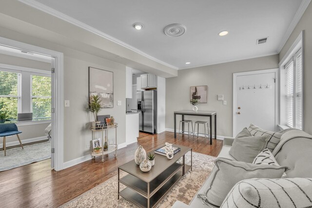 1438 W Roscoe St Unit 3, Chicago, IL 60657 - living room with crown molding, dark wood-style floors, and recessed lighting
